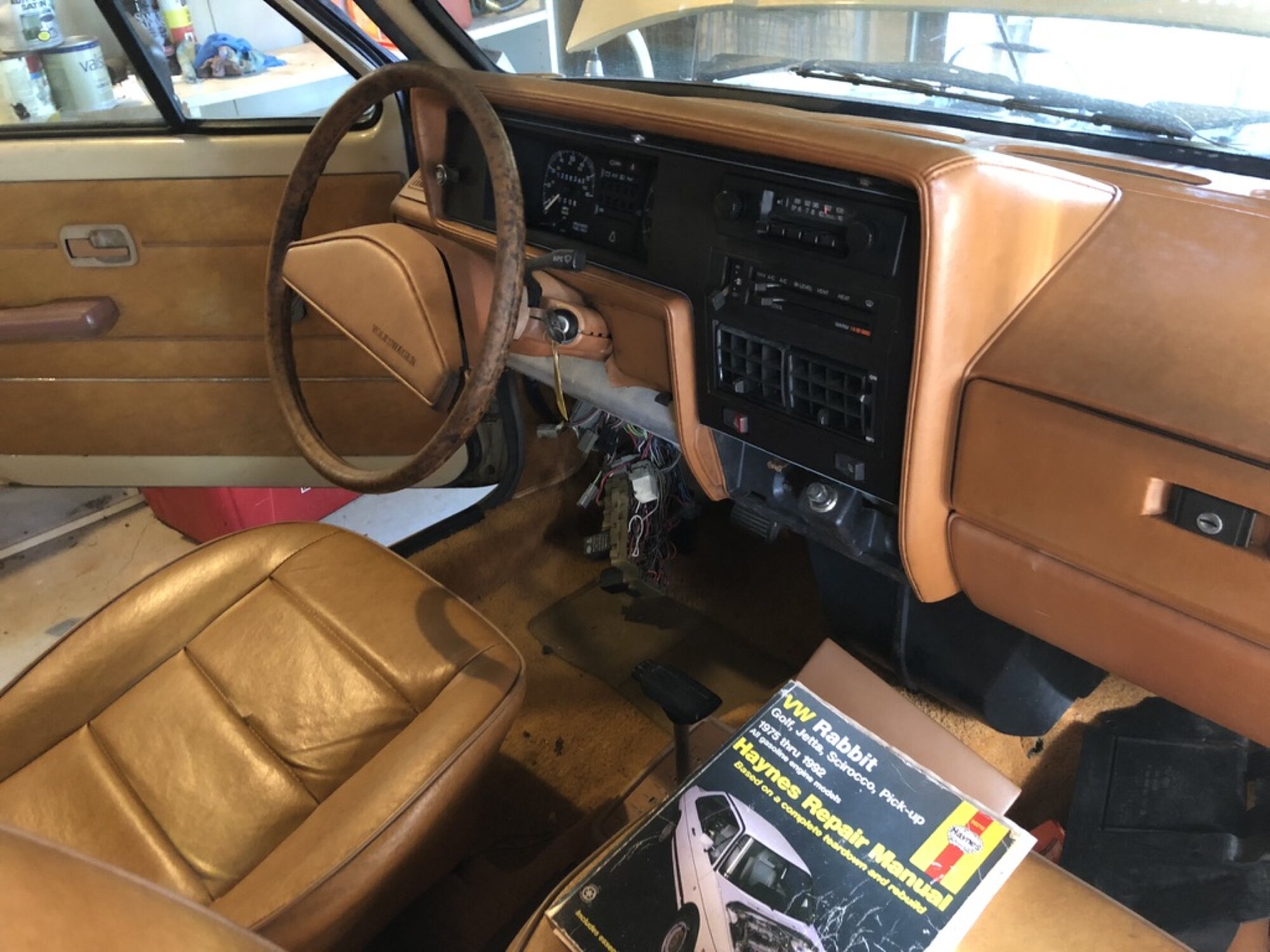 Original interior before the swap, wiring already opened up